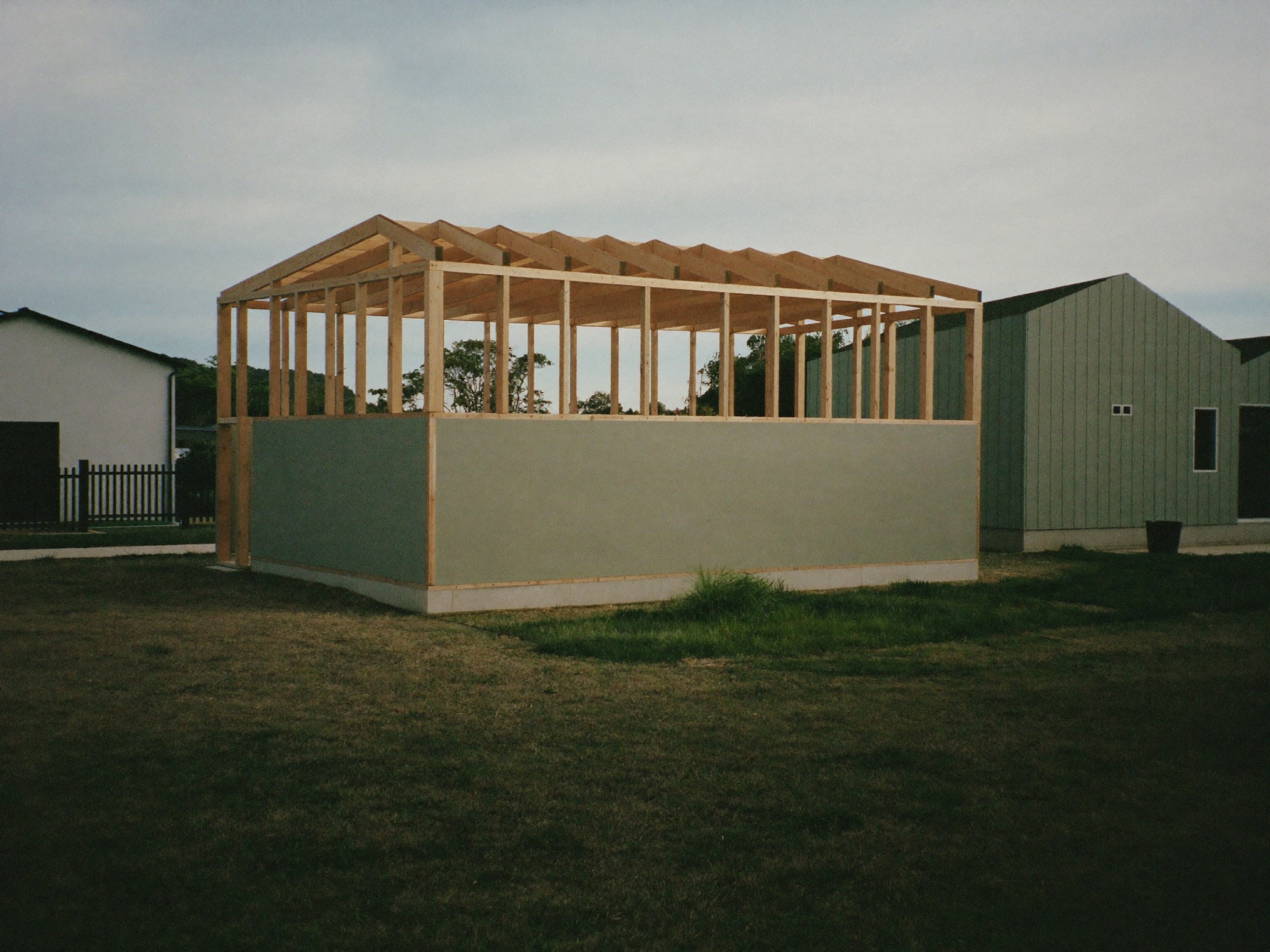 A new home at frame stage in a growth-corridor estate